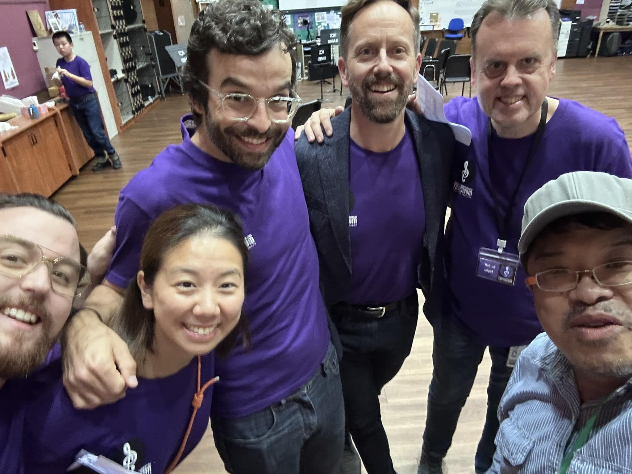 Group photo of Ringo Chan, Dr. Rob Taylor, Christopher Ward, Carolyn Ho, and Liam Callan at International Schools MusicFest Fall 2023