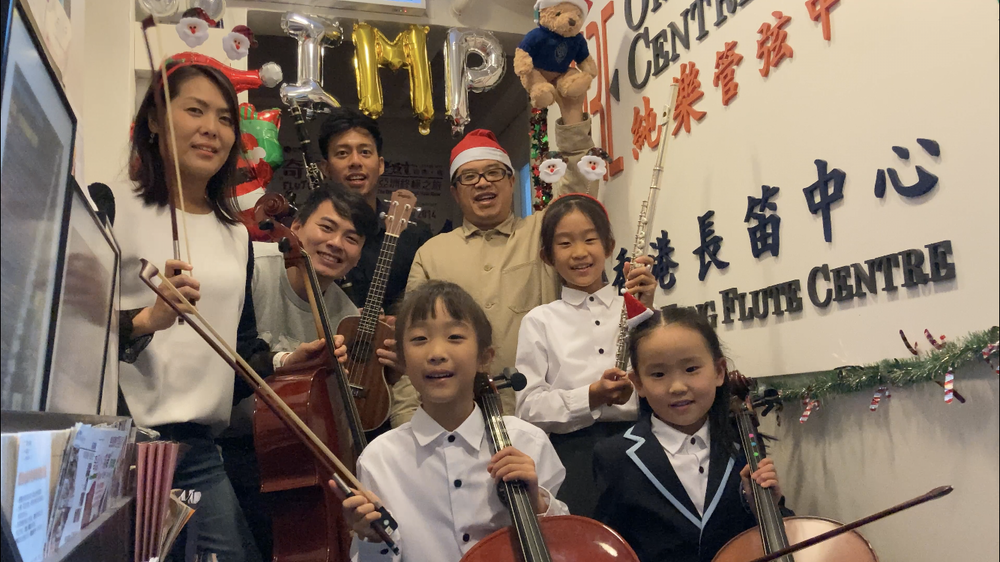 This is a group photo with Ringo, our director, Nigel, an experienced instructor, Lily & Leah, their fellow students with their parents.