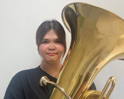 Meet Vivian, she's a talented instructor who loves playing brass.